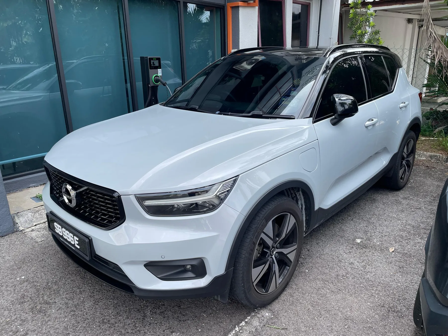 The same car in its factory white paint