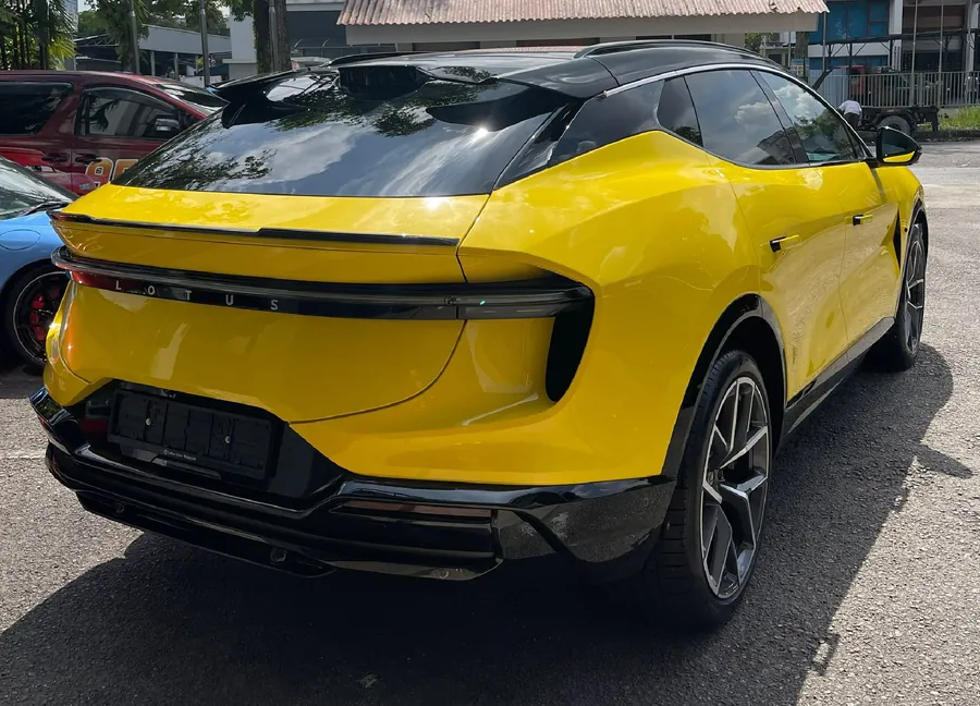 Car finished in a yellow Colour PPF